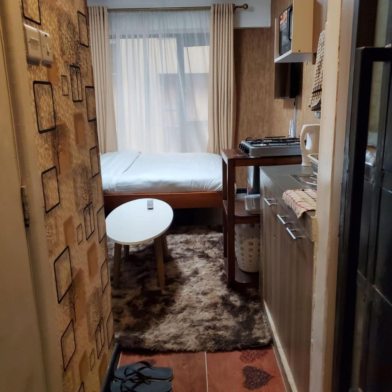 Lovely & Cozy Compact Studio Near Airport With Rooftop View Apartman Nairobi Kültér fotó