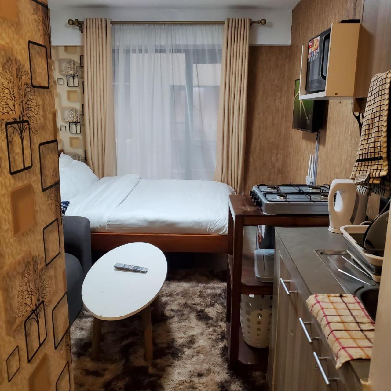 Lovely & Cozy Compact Studio Near Airport With Rooftop View Apartman Nairobi Kültér fotó